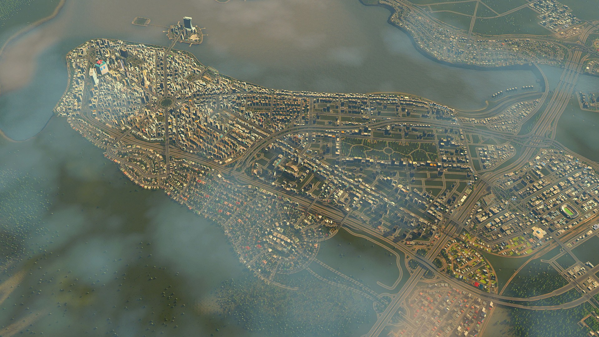 Aerial view of a large Cities: Skylines city stretching across a coastline